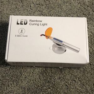 The LED Rainbow curing light is brand new and well worth the price